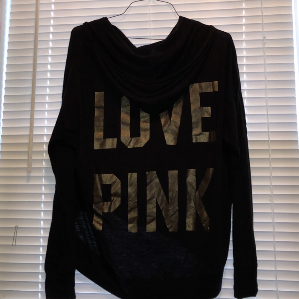 Black pink sweatshirt with gold writing